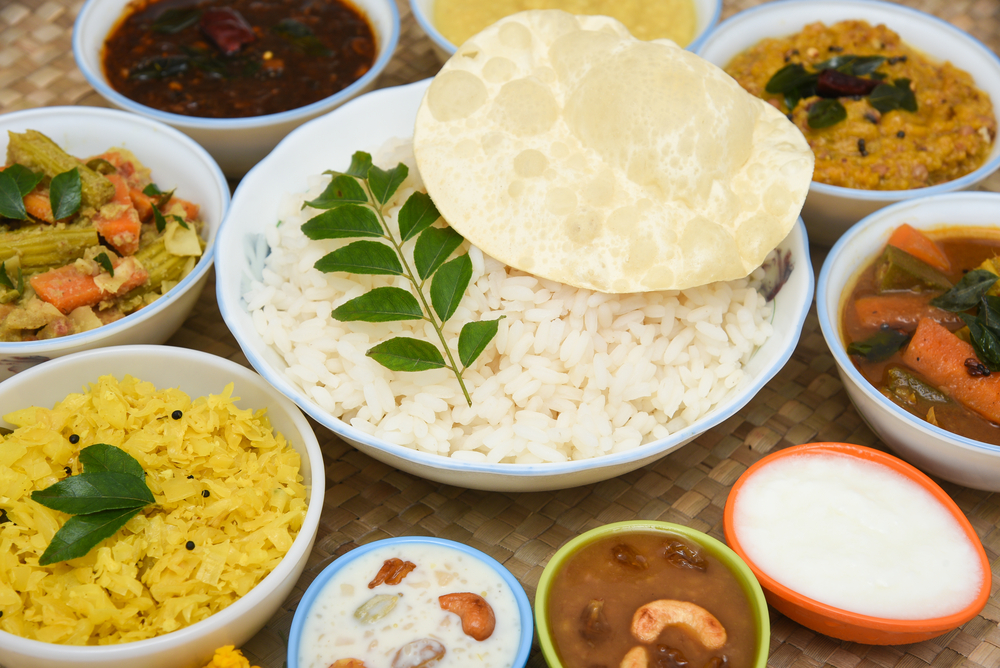 A bowl of rice topped with a green leaf, served at Mon Ami City Hotel's on-demand food service.