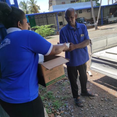 Mon Ami City Hotel donates food to a person, highlighting their commitment to community welfare and assistance for those in need.